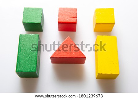 wooden pieces of basic shapes of the typical children's block construction