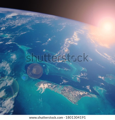 Wonderful sunlight above earth. The elements of this image furnished by NASA.
