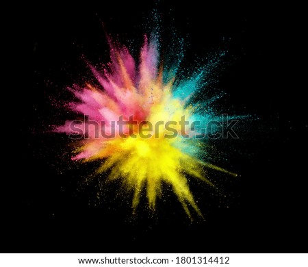 Colorful powder explosion isolated on black background, abstract background Royalty-Free Stock Photo #1801314412