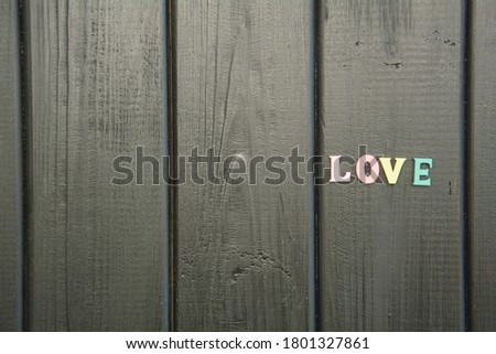  The word love on a brown background, love lettering, design, background, advertising, banner, brown background, dark design, love on a dark background