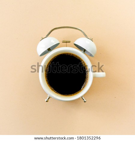 Composition - Coffee time, сoffee clock on yellow background. Flat lay, top view