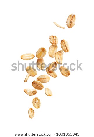 falling oatmeal on a white background Royalty-Free Stock Photo #1801365343