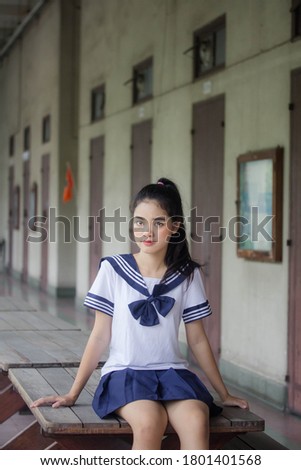 japanese teen beautiful girl in student uniform happy and relax