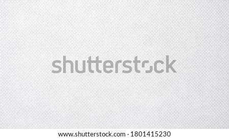 Closeup white sport clothing fabric jersey texture background.
Abstract grey mesh cotton for seamless pattern.
top view.