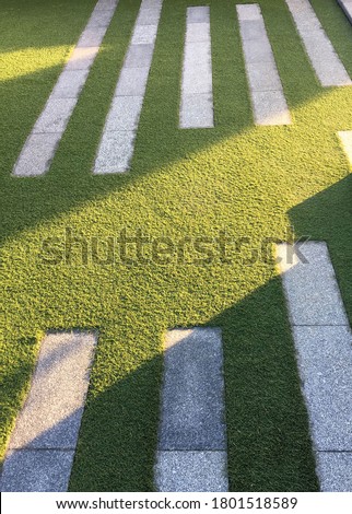 Abstract and background of light and shadow on playground in the evening