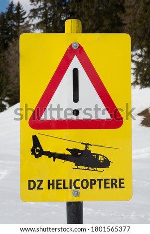 Warning sign helicopters in Montana (Switzerland)