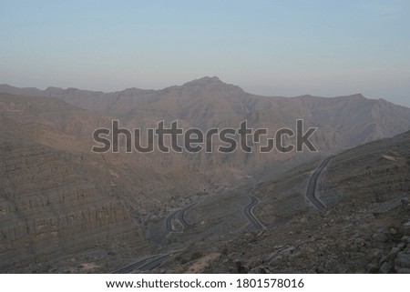 beautiful picture of mountains with roads beneath