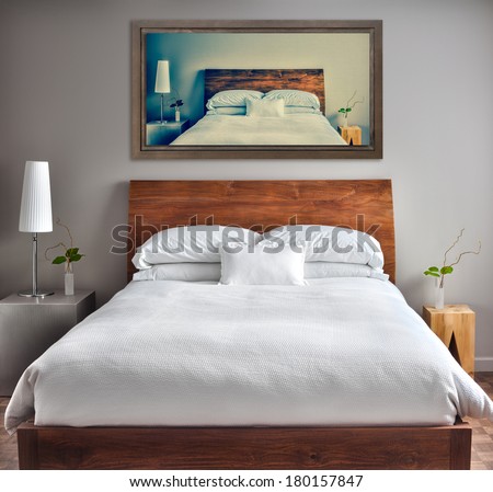 Beautiful Clean and Modern Bedroom with fun Canvas on the Wall that is a repetition or infinity concept