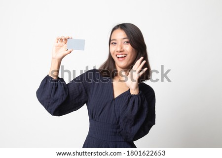 Young Asian woman happy with  blank card on white background