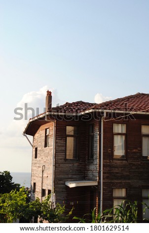 Traditional wooden house facing Black Sea against blue sky. Akcakoca Turkey