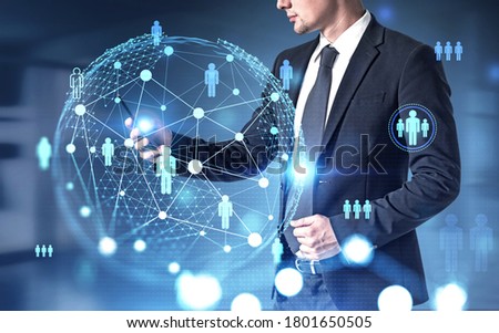 Unrecognizable businessman using smartphone in blurry office with double exposure of HR interface. Toned image