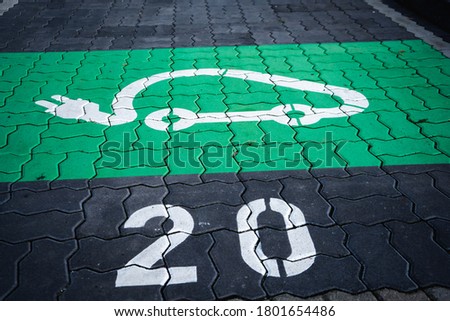 green electriccar parking lot, number twenty, in mainz Royalty-Free Stock Photo #1801654486