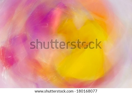 bizarre combination of yellow and red flowers in a circular motion 
