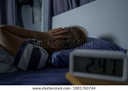 Women are stressed because they suffer from insomnia at night. Royalty-Free Stock Photo #1801760764
