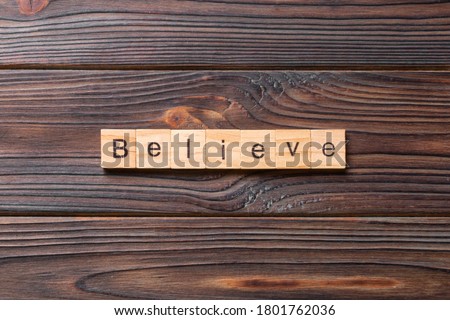 believe word written on wood block. believe text on table, concept. Royalty-Free Stock Photo #1801762036