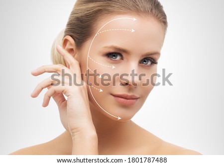 Close-up portrait of young, beautiful and healthy woman ready for plastic surgery treatment.