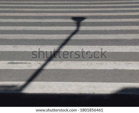 Pedestrian lane crossing and shadows