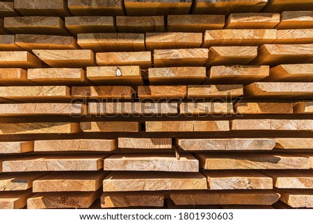 Detail wooden planks. Air-drying timber stack. Wood air drying (seasoning lumber or wood seasoning). Timber. Lumber. Royalty-Free Stock Photo #1801930603