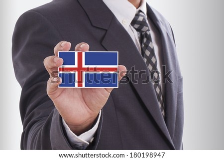 Businessman holding a business card with Iceland Flag 