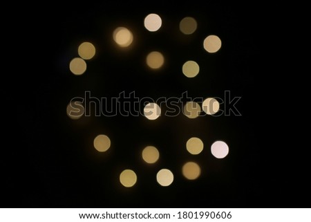 Abstract yellow and white spotted bokeh background