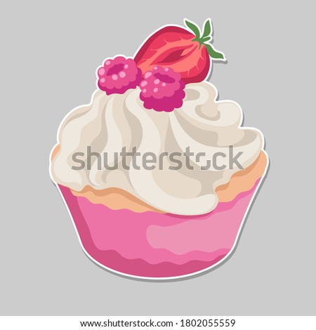Pink cupcake with raspberries and strawberries