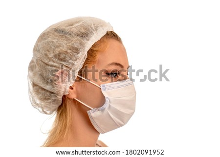 Coronavirus concept. Girl wearing a protective medical mask. Protect your health. Stop the virus and pandemic covid-19. White background.
