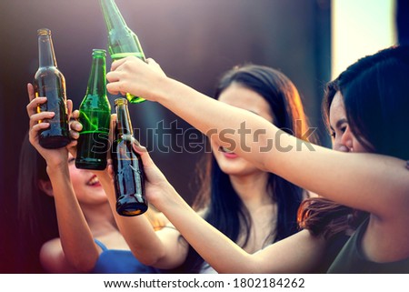 Party time start. Happy people toasting with champagne flutes. Multiethnic friends congratulating each other with new year. Celebration holiday concept, holiday background. selective focus.