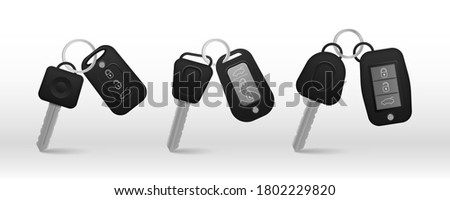 Set of electronic car key front and back view and alarm system. Realistic car keys black color isolated on white background. 3d realistic mockup. Vector illustration, eps 10. 