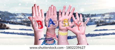 Children Hands Building Word Baby, Snowy Winter Background