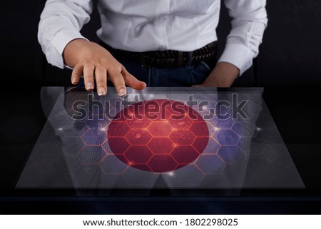 Business woman touching screen with Japan flag