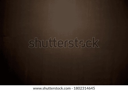 Vintage brown background wall texture with spotlight