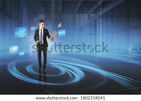 Young businessman with clipboard working in blurry office with double exposure of cloud computing interface. Toned image