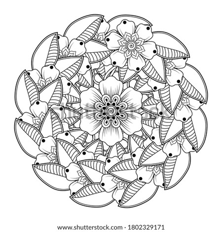 Circular pattern in form of mandala with flower for henna, mehndi, tattoo, decoration.