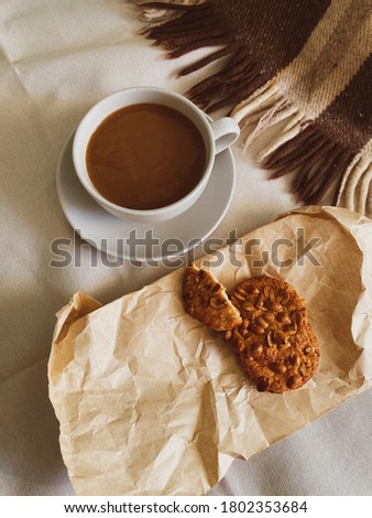 Cup of coffee and cookies in retro style