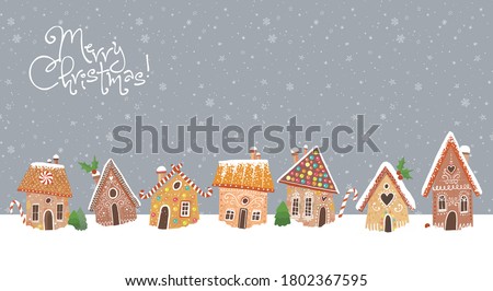 Christmas greeting card with cute gingerbread houses. Royalty-Free Stock Photo #1802367595