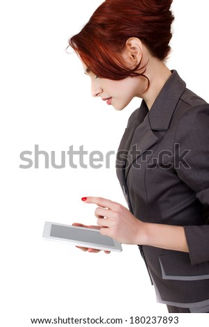 young business red hair  woman with tablet pc side view