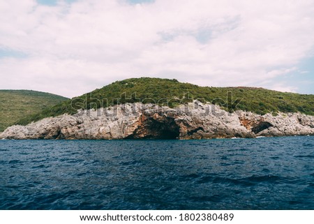 A cave in a rock on the Lustica Peninsula, in Montenegro.