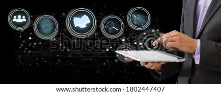 Businessman focused on case study. study online, e learning Royalty-Free Stock Photo #1802447407