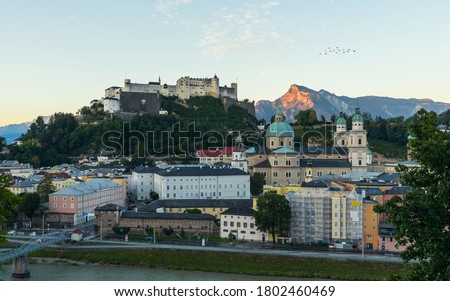 Salzburg Austria Morning cityscape. Included all attractions in the city. This amazing place is Wolfgang Amadeus Mozart's hometown. Central alps mountains on the background