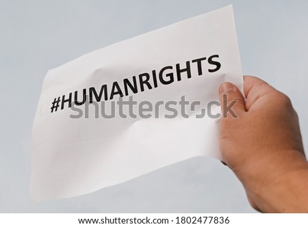 Messages displayed during protests. Banner with the message "#human rights." Protesters accuse human rights violations.