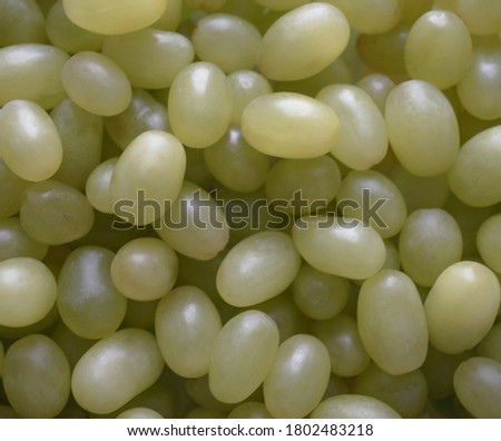 background from grapes. a bunch of green grapes close up
