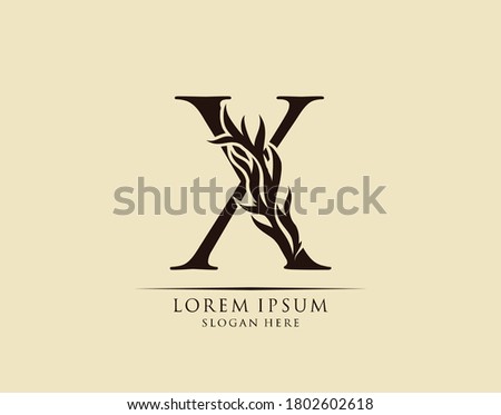 Callygraphy X Letter. Graceful royal style. Calligraphic arts logo. Vintage drawn emblem for book design, brand name, stamp, Restaurant, Boutique, Hotel.  