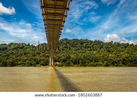 suspension iron cable bridge isolated with bright blue sky from unique different angle image is taken at honnavar karnataka india. it is the fine example of modern engineering.