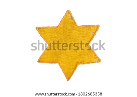 Yellow Star Of David real world war relic Royalty-Free Stock Photo #1802685358