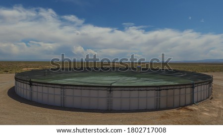 battery of water tanks in reservoir