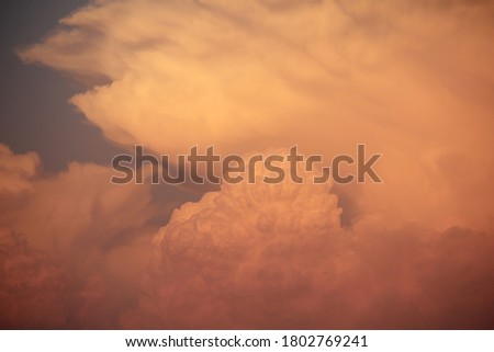 Clouds close up at orange sunset