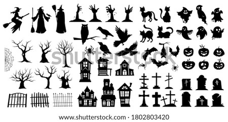 Very large set of black vector Halloween silhouettes with witches, birds, pumpkins, haunted houses, trees, ghosts and graves for use as design elements Royalty-Free Stock Photo #1802803420