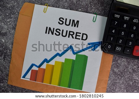 Sum Insured text with document brown envelope isolated on office desk.
