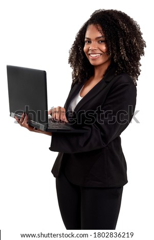 Cheerful and smiling executive black Brazilian woman isolated on white background, working with a notebook.