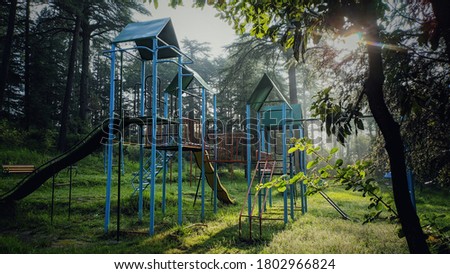 uttarakhand,india-2 june 2020:slide house in the park.this is a picture of a park in forest which shows slides.View of park.simtola.closed park during corona pandemic.wallpaper.wallpaper of play zone.